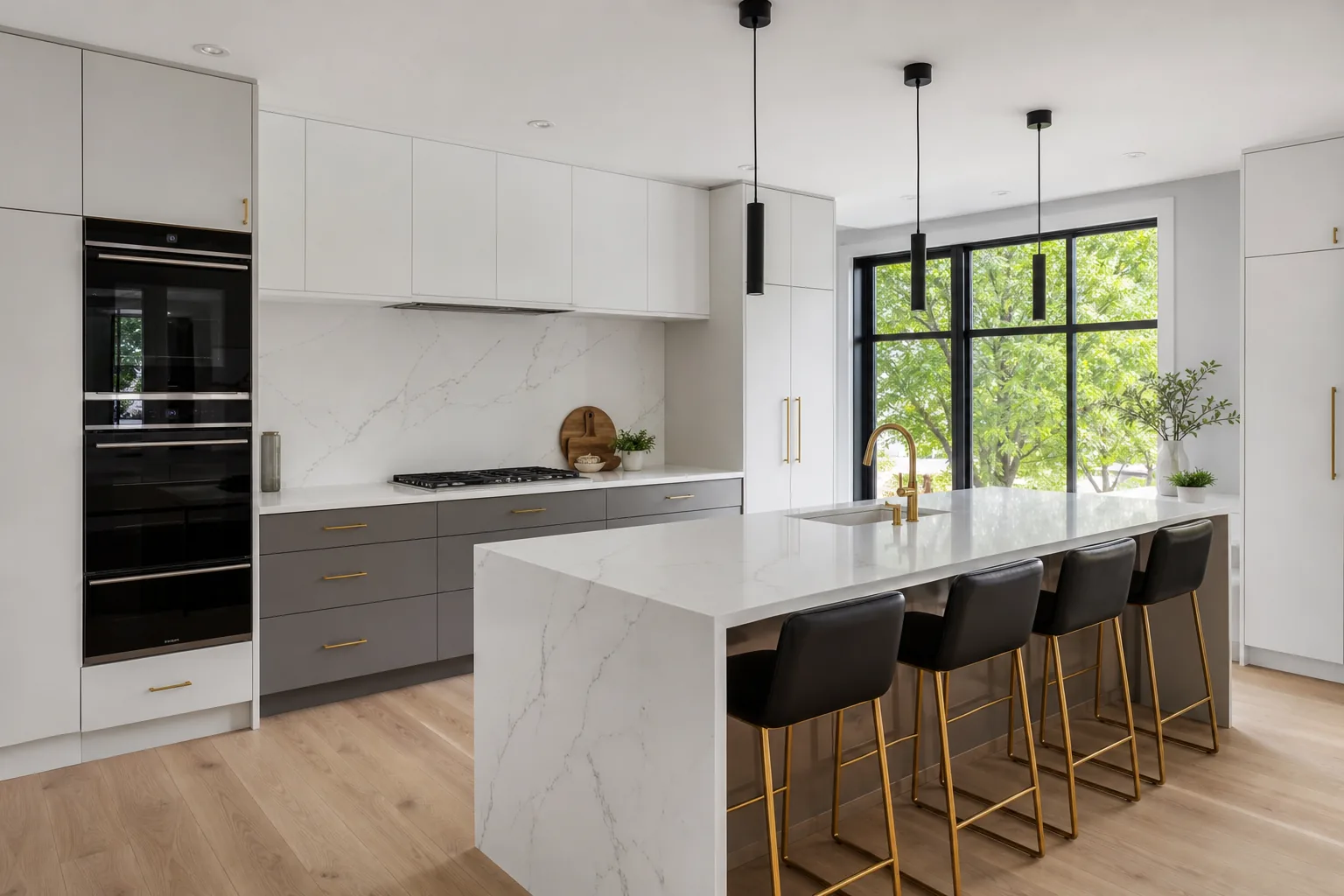 Modern kitchen renovation with flat-panel cabinets, quartz island, and integrated appliances